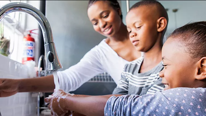 family washing hands